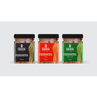 KOMADIĆI DIMLJENE PASTRMKE U MASLINOVOM ULJU BIJELI LUK 130g BARIBA